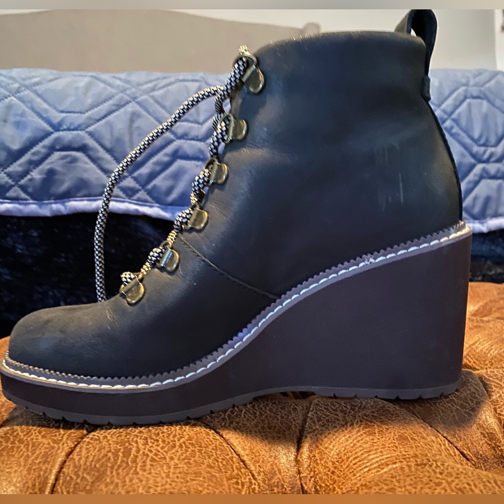 Tom’s wedge booties. Super comfortable 5.5 only used once.
